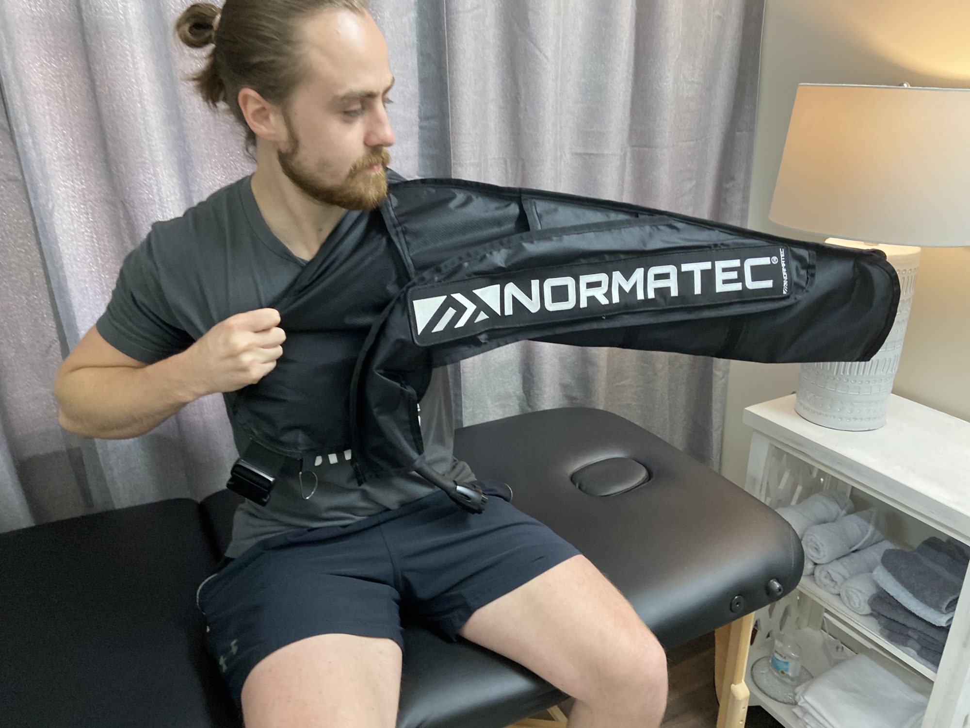 patient using NormaTec at CryoStretch Blount